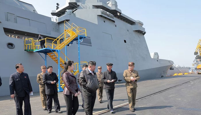 North Korean leader Kim Jong Un and his daughter Kim Ju Ae attend what state media KCNA reported was a test-firing of the weapons system of the new Choe Hyon-class warship, in this picture released on April 30, 2025. — Reuters