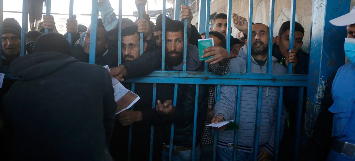 Gazans queue for food in January 2025 when it was more widely available in the enclave.