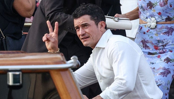 Actor Orlando Bloom gestures as he leaves Gritti Palace Hotel, ahead of the anticipated wedding of Amazon founder Jeff Bezos and journalist Lauren Sanchez in Venice, Italy, June 26, 2025. — Reuters
