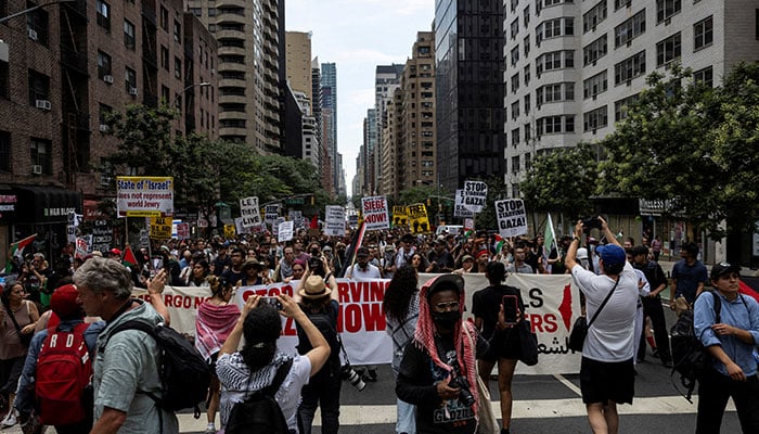 People march near the United Nations headquarters during a Stop Starving Gaza Now protest  in New York City, US on July 25, 2025. — Reuters