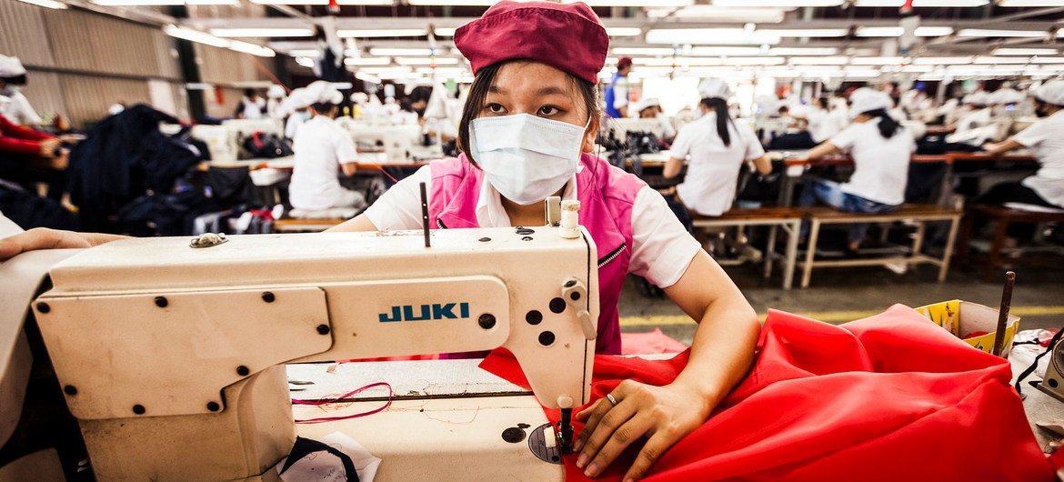 A woman works at a Better Work-affiliated factory in Viet Nam.