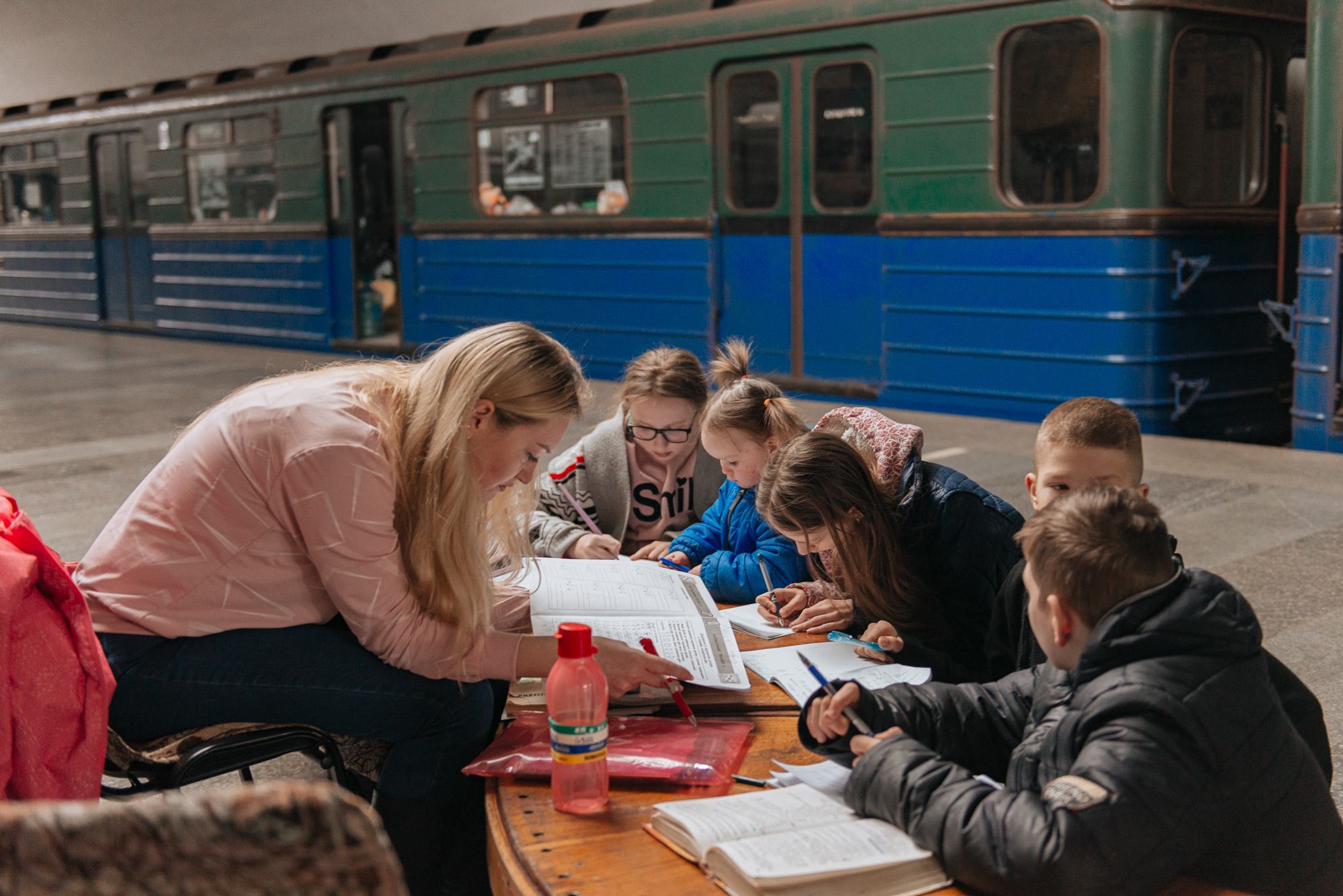 Children study in a shelter in Kharkiv metro in Ukraine.