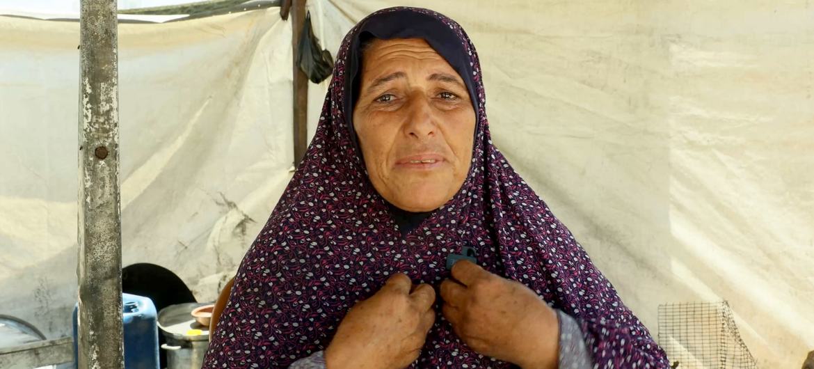 Badriya Barrawi, a displaced person in Gaza, is living among the ruins of destroyed buildings.