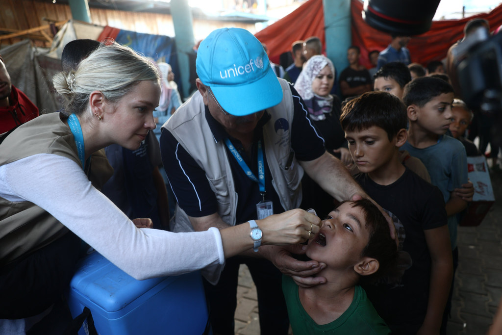UNICEF staff vaccinate children against polio in September 2024.