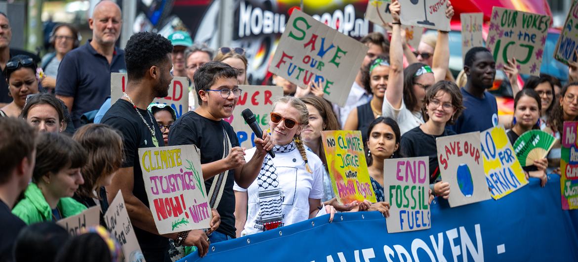 Activists outside the International Court of Justice (ICJ) in The Hague as the Court delivers its advisory opinion on the obligations of States in respect of climate change.