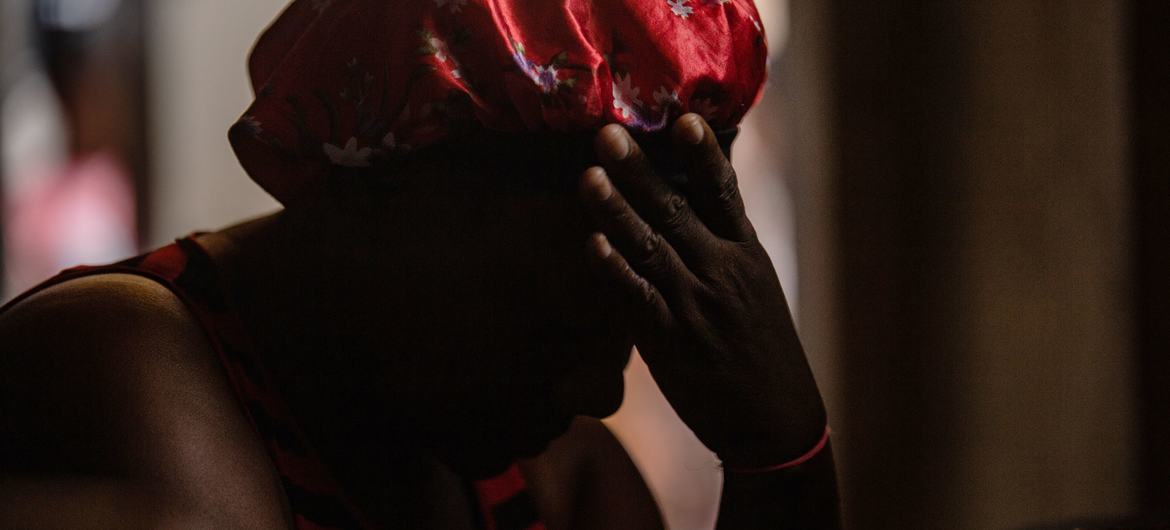 A survivor of rape rests at a site for internally displaced people in Port-au-Prince.