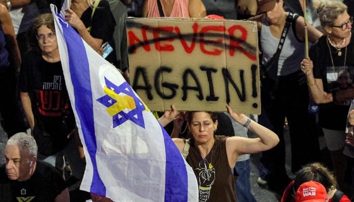 Demonstrators gather during an anti-government protest, outside the Israeli Defence Ministry headquarters in Tel Aviv on August 2, 2025. — AFP
