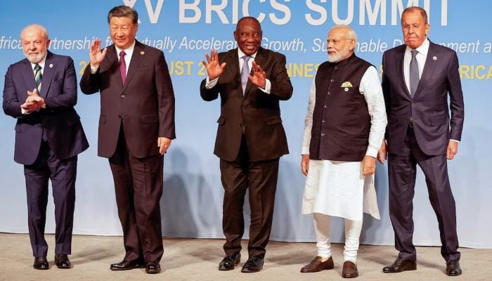 President of Brazil Luiz Inacio Lula da Silva, President of China Xi Jinping, South African President Cyril Ramaphosa, Prime Minister of India Narendra Modi and Russias Foreign Minister Sergei Lavrov pose for a BRICS family photo during the 2023 BRICS Summit at the Sandton Convention Centre in Johannesburg, South Africa, on August 23, 2023. — Reuters