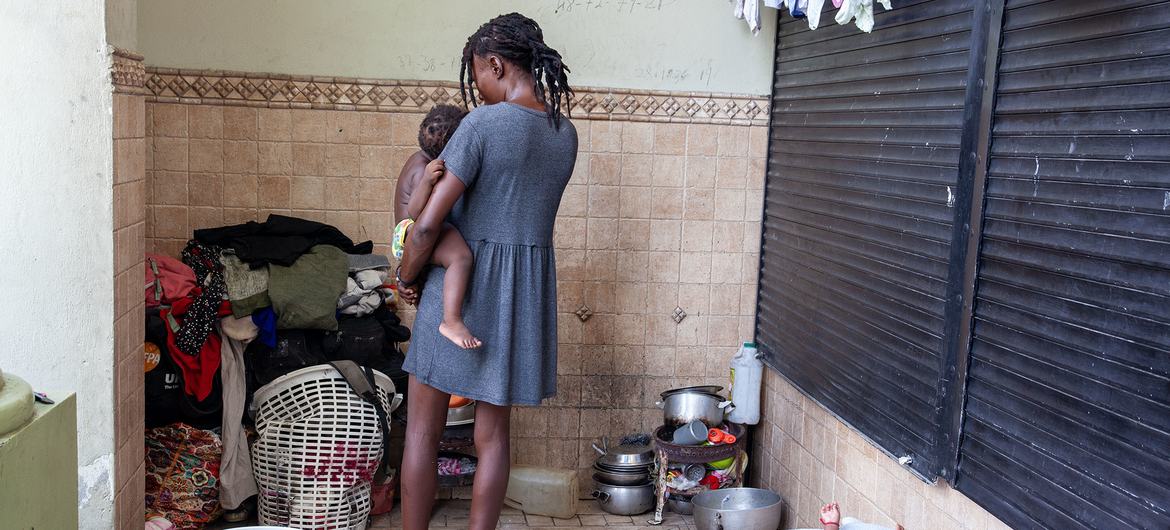 A woman says she was raped while fleeing from gang violence with her six children and while she was four months pregnant.