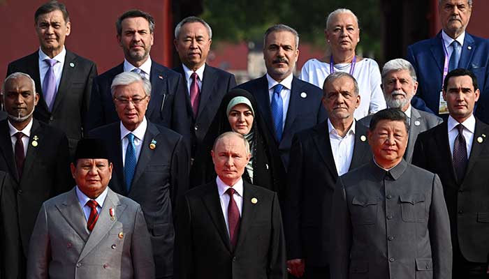 Chinese President Xi Jinping (bottom right) and Russian President Vladimir Putin (front centre) pose for a group photo along with dignitaries of other countries at a military parade in Beijing, China September 3, 2025. — Reuters