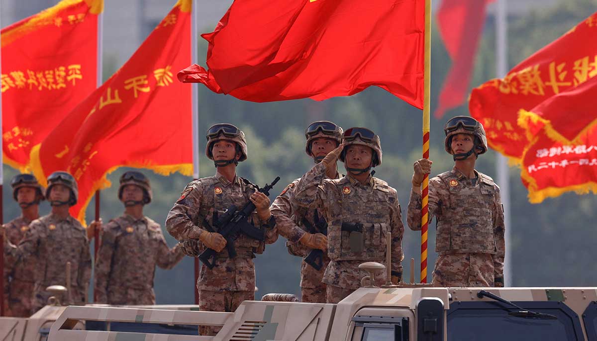 Flags flutter during a military parade to mark the 80th anniversary of the end of World War II, in Beijing, China, September 3, 2025. — Reuters