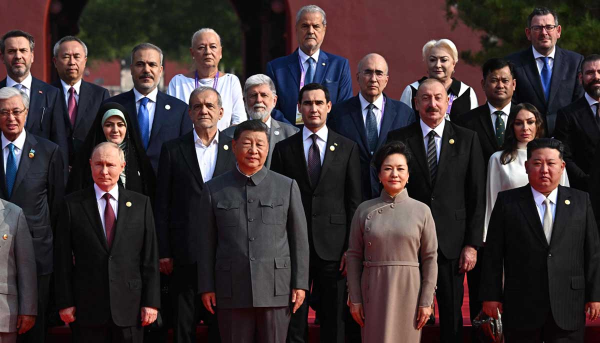 Chinese President Xi Jinping (bottom right) and Russian President Vladimir Putin (front centre) pose for a group photo along with dignitaries of other countries at a military parade in Beijing, China September 3, 2025. — AFP