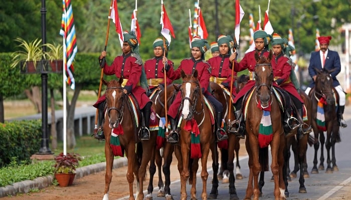 In this photograph taken on August 15, 2025, students mounted on horses wait to perform during India´s Independence Day celebrations at the Mayo College school in Ajmer, India. — AFP
