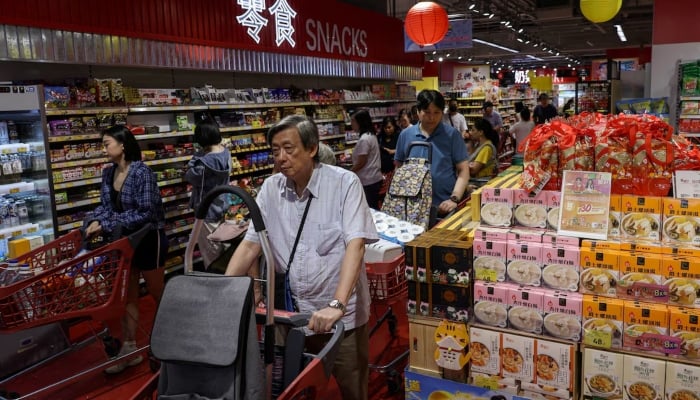 Residents stock up on supplies at a supermarket to prepare for the approaching Typhoon Ragasa, in Hong Kong, China, September 22, 2025. — Reuters