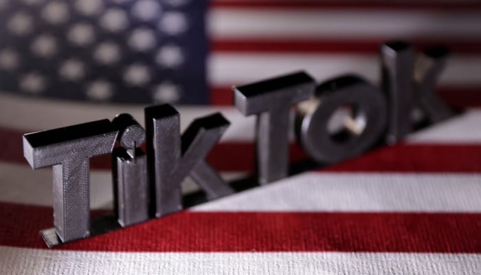 TikTok logo is placed on a U.S. flag in this illustration taken, April 25, 2024. — Reuters