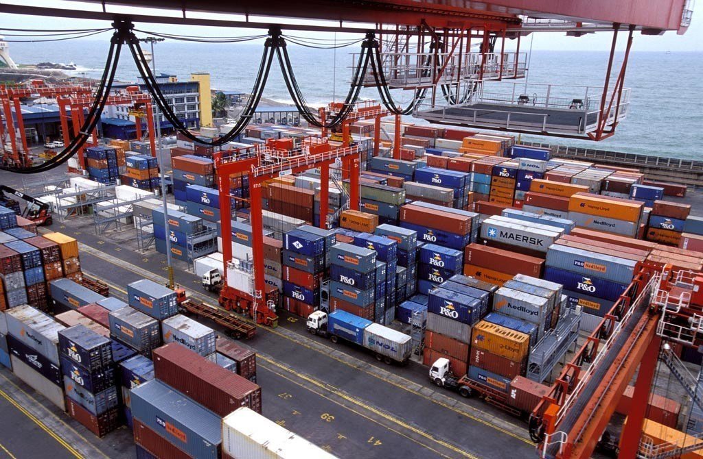 Quay cranes on docks in Sri Lanka. The global economy is critically dependent on the international merchant fleet of carriers and tankers to keep commodities moving swiftly, safely and efficiently.