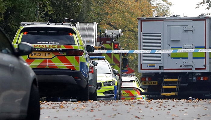 A bomb disposal robot works at the scene, after a report of an incident in which a car was driven at pedestrians and a stabbing attack outside a synagogue, in north Manchester, Britain, October 2, 2025. — Reuters