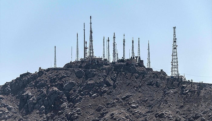A general view shows the telecommunication towers installed on a hilltop in Kabul on September 30, 2025. — AFP
