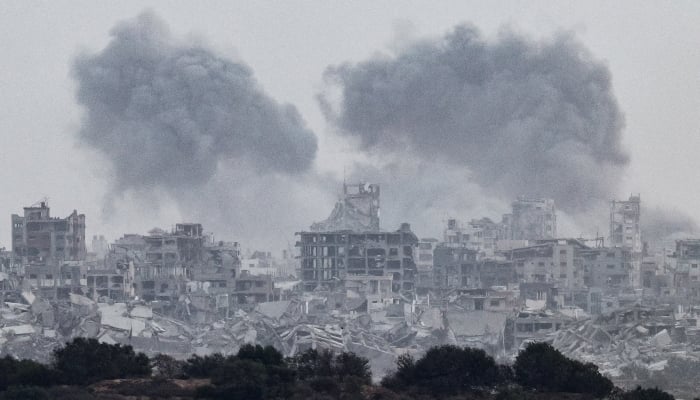 Smoke rises from Gaza after explosions, as seen from the Israeli side of the border with Gaza, October 5, 2025. — Reuters