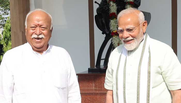 Indian PM Narendra Modi (right) pictured with RSS chief Mohan Bhatwat. — DD News/File