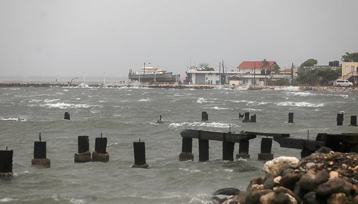 Waves travel towards the coastline, as Hurricane Melissa approaches, in downtown Kingston, Jamaica, October 28, 2025. — Reuters
