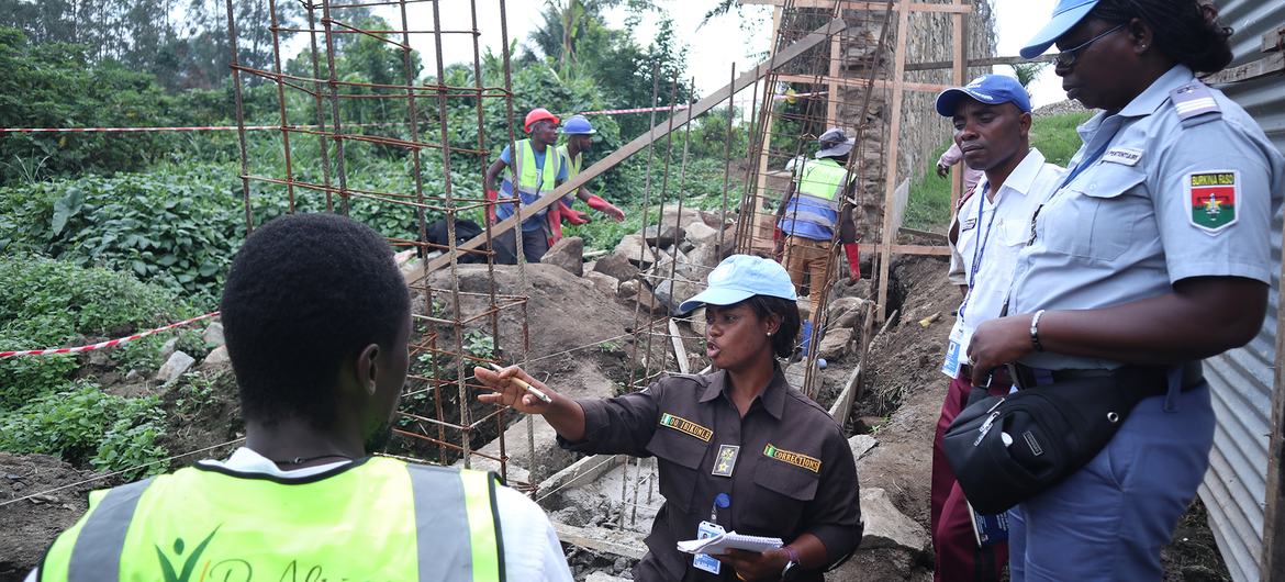 Olukemi Ibikunle (center) supervises the construction of a prison in eastern Democratic Republic of the Congo (DRC).