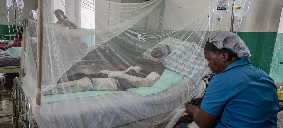 A man is treated for severe burns in hospital after gangs attacked and caused a fire in the gas station where he worked.