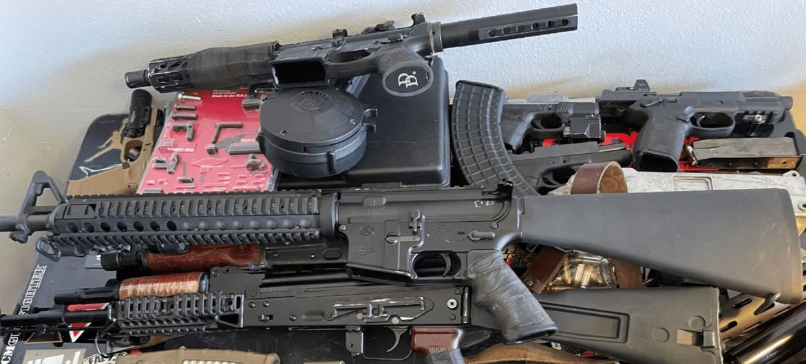 Weapons seized by US law enforcement authorities which were destined for Haiti are put on show. 
