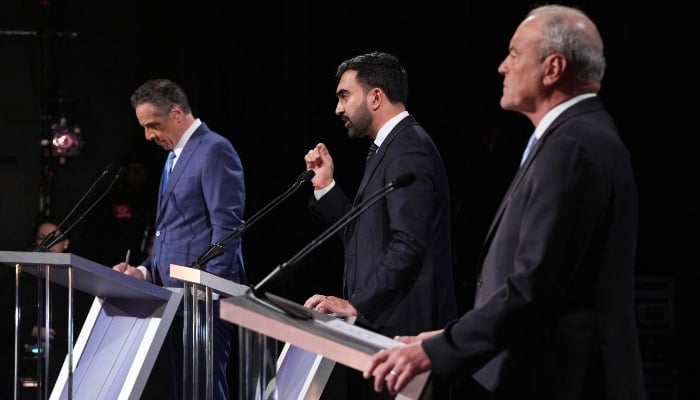 (L-R) Independent candidate and former New York Governor Andrew Cuomo, Democratic candidate Zohran Mamdani and Republican candidate Curtis Sliwa participate in the second New York City mayoral debate at LaGuardia Performing Arts Centre at LaGuardia Community College in Long Island City, Queens, New York, on October 22, 2025. — AFP
