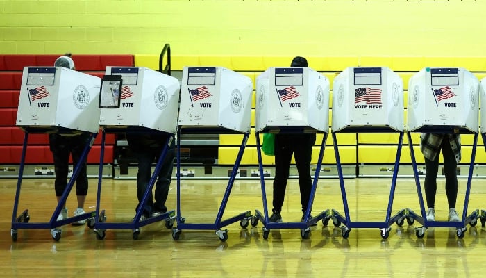 People take part in early voting at a polling centre in the Manhattan borough of New York, US, during early voting for the upcoming mayoral election, on October 27, 2025. — AFP