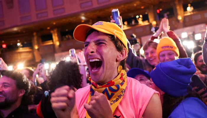 Supporters celebrate as initial projections of Democratic candidate for New York City mayor Zohran Mamdani win are declared during an election night watch party in the Brooklyn borough of New York City, New York, US, November 4, 2025. — Reuters