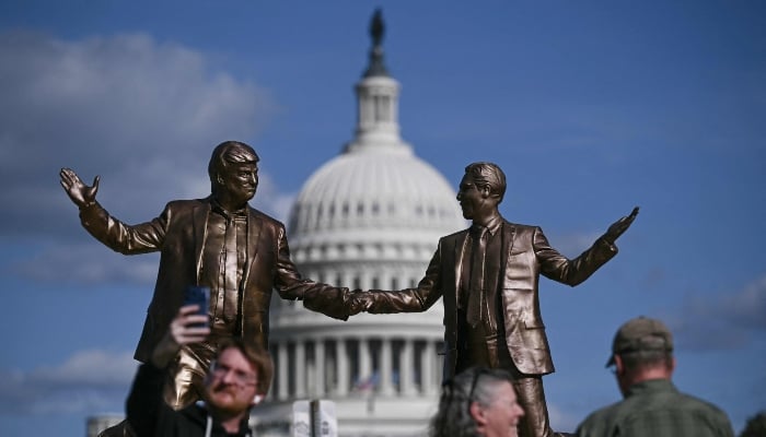 A statue depicting US President Donald Trump and Jeffrey Epstein holding hands is seen near the US Capitol on October 2, 2025, in Washington, DC, US. — AFP