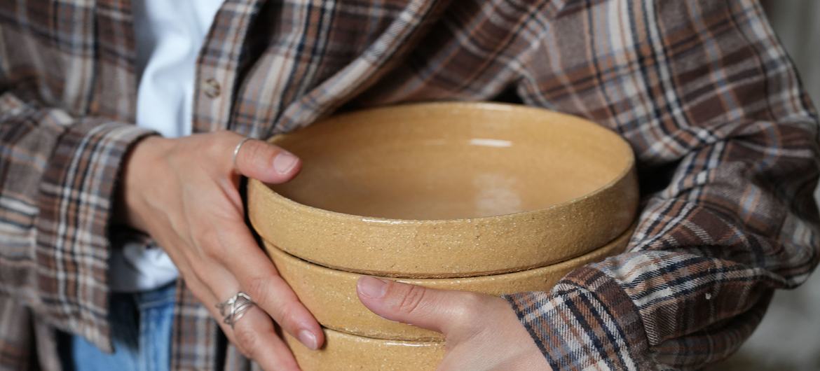 Elvira Demerdzhi holds dishes which reflect her Crimean Tatar roots.